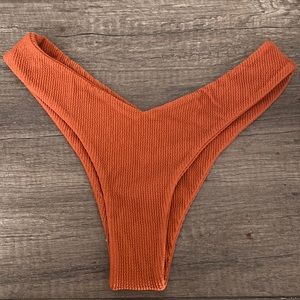 Terracotta crinkle medium bikini bottom by Koana Swim. Never worn
